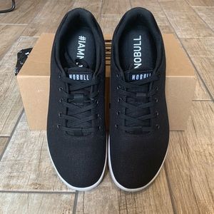 Black ivory canvas trainers